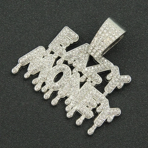 Macro shot of silver hip-hop MONEY letter pendant with iced-out crystal drip design