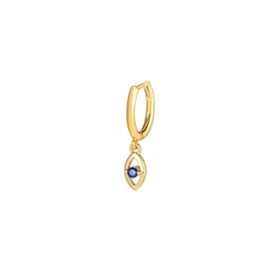 Macro view of gold devil's eye charm earring featuring a deep blue zircon gemstone