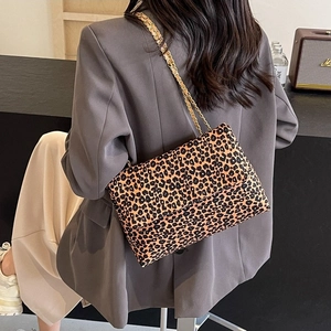 Trendy leopard print shoulder bag for women with gold chain strap and flap closure