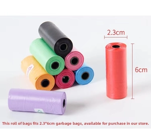 Detail view of the pill-shaped waste bag dispenser with 2.3x6cm size dimensions