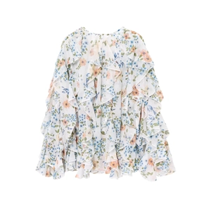 Detail of multi-layered ruffled sleeves and floral print on white chiffon shirt