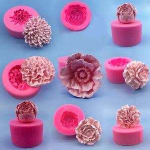 Detailed pink silicone molds showing peony and rose floral shapes for DIY crafts