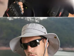 Détail d'un chapeau de soleil gris avec bord large de 8 cm et cordon réglable