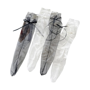 Sheer mesh sleeve covers with bow ribbon detail in black, white, and grey colors