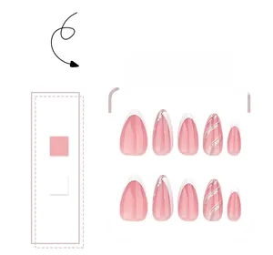 Detail of almond-shaped pink press-on nails with white French tips and silver glitter swirls