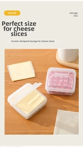 Stackable transparent cheese slice storage container with lid on a wooden countertop