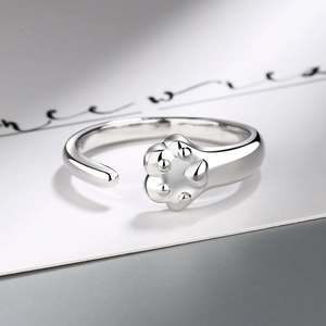 Minimalist adjustable silver cat paw open ring with high-polish metallic finish