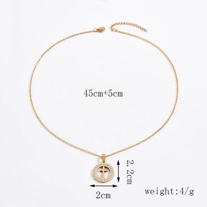 Detail shot of gold cross necklace with crystal pavé and 45cm chain dimensions