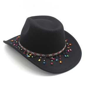 Detail of black western cowboy felt hat with ethnic style colorful beaded fringe trim