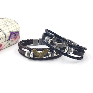 Bracciali multistrato in pelle intrecciata retrò con ciondoli a forma di aquila in marrone e nero