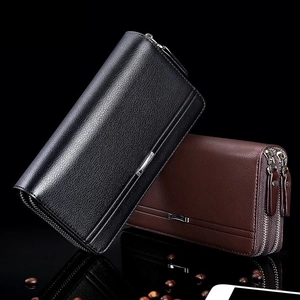 Detail of premium lychee texture leather on black and brown double zip men's wallets