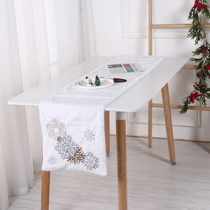 White plush Christmas table runner with snowflake embroidery for holiday party dining decor