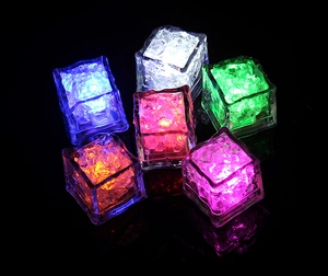Macro shot of colorful LED ice cubes in six colors with realistic crystal textures