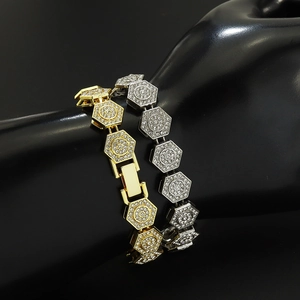 Men's geometric iced out hexagon bracelet in gold and silver finish on wrist