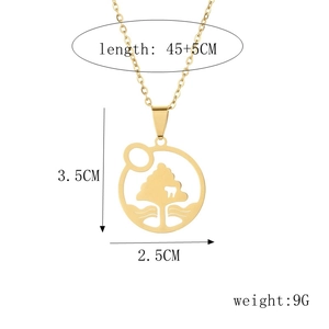 Detail of gold tree pendant necklace with 45+5cm chain length and 3.5cm height