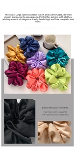 Detailed close-up of oversized smooth satin hair scrunchies in various elegant colors
