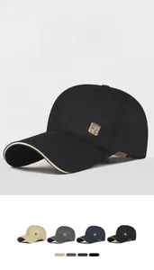 Detail of baseball cap side showing metal seal logo and small SPORT woven label text