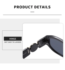 Detail of the reinforced golden hinge on black square frame fashion sunglasses
