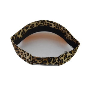 Detail shot of leopard print sun visor hat featuring fabric texture and inner lining