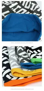 Detail of soft breathable knit fabric and blue ribbed lining on a slouchy beanie hat