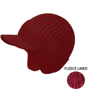 Macro detail showing thick fleece lining and knit texture of burgundy winter earflap hat