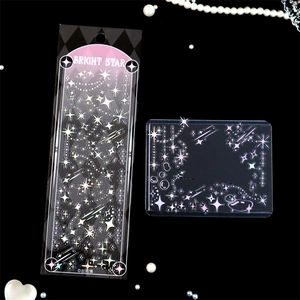 Detail view of laser holographic star stickers with silver foil for DIY journaling