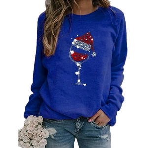 Women's blue long sleeve Christmas wine glass print sweatshirt with a crew neck
