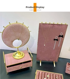 Pink velvet jewelry stand set with gold metal frames for necklaces and earrings