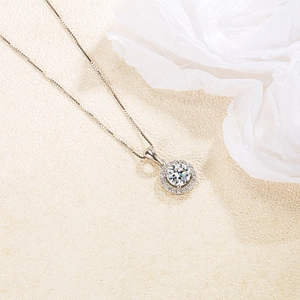 Elegant S925 sterling silver necklace with large round zirconia pendant on white veil