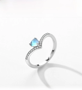 Detailed macro view of S925 silver V-shaped ring featuring a heart blue moonstone