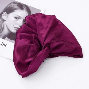 Adjustable solid wine red satin silk sleep cap for women with a twisted front design