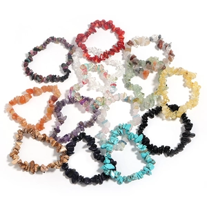 Macro display of irregular natural agate and crystal stone stretch bracelets in bulk