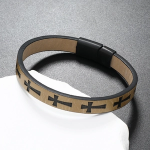 Close-up of khaki leather multi-layer bracelet with black cross pattern and magnetic clasp