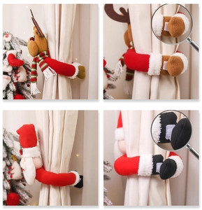 Detail of Santa and Reindeer curtain buckles with velcro attachment and plush texture
