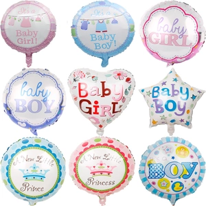Detail of pink and blue baby shower foil balloons in crown star and heart shapes