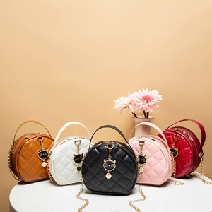 Women Round Handbag PU Leather Quilted Diamond Pattern Crossbody Bag With Cat Charm Chain Strap Mini Fashion Shoulder Bag