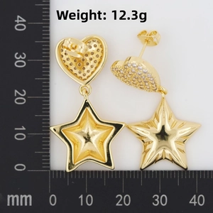 Macro shot showing weight of 12.3g for gold heart stud and star pendant earrings