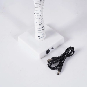 Detail of LED birch tree light white square base with power switch and USB cable
