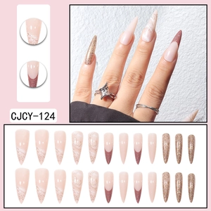 Long stiletto press-on nails featuring pink marble patterns and glitter French tips
