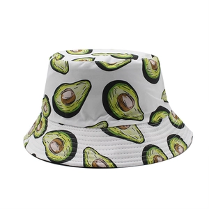 Detailed stitching and realistic avocado print on a white canvas bucket hat texture