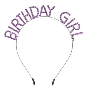 Detail of silver birthday girl headband with sparkling purple rhinestone lettering