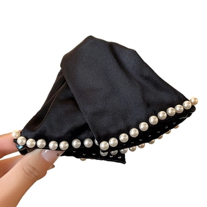 Elegant black satin fabric hair claw clip with white faux pearls for women styling
