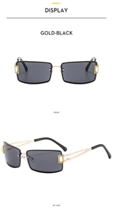 Close-up of gold-black rimless square sunglasses with diamond-encrusted metal hinges