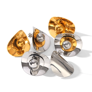 Minimalist gold and silver asymmetric earrings with organic curved design and metal beads