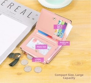 Pink short PU leather wallet interior view showing card slots and cute rabbit pendant