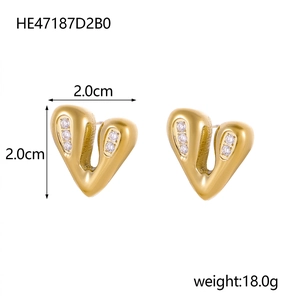 Detailed view of heart-shaped gold earrings with white crystals and dimensions