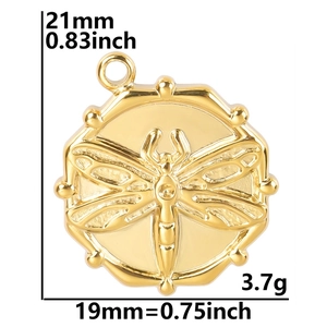 Detailed view of golden dragonfly pendant showing 21mm dimensions and metal texture