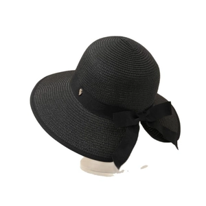 Chic black woven straw sun hat with large brim and elegant bow for summer beach