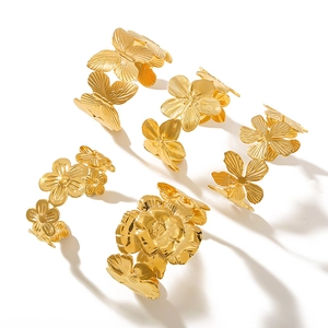 Golden flower and butterfly open adjustable wide bangle bracelet in 18K gold plated steel