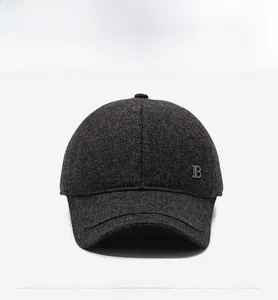 Front view of a dark gray thermal baseball cap with textured fabric and metal B logo